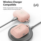 AirPods Pro Case - Peach Pink - Two peach pink AirPods Pro cases, one charging via cable and one on a wireless pad.