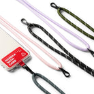 Holder Link Strap | Tarpaulin Red - A clear phone case with a red Handle With Care label attached to various colorful rope straps.