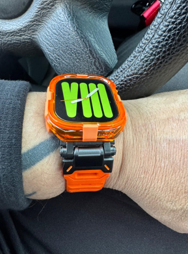 Wrist wearing Apple Watch covered with orange case and band