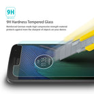 Moto G5 Plus Screen Protector | Invisible Defender Glass [2P] - Moto G5 Plus Screen Protector - A utility knife blade scratches a tempered glass screen protector on a Moto G5 Plus phone.