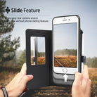 iPhone 8 / 7 / SE 2020 / SE 2022 Case | Wallet - Hands holding a phone in a black wallet case sliding upward to expose the camera.