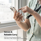 Lanyard Strap | Black - Person wearing a black phone lanyard while holding a smartphone in a clear case.