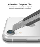 iPhone XR Camera Protector Glass [3 Pack] - A utility knife blade scrapes against a camera lens protector on a white phone.