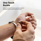 Apple Watch 49·46·45·44·42 mm | Metal One Band α - Silver - Apple Watch Metal One Band α - Silver - Hand opening the silver metal butterfly clasp on a watch band.