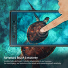 Xperia XZ1 Compact Screen Protector | Invisible Defender - Xperia XZ1 Compact Screen Protector - Finger touching a sea turtle image on a Sony smartphone screen protector.