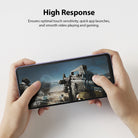 Galaxy A72 Screen Protector | Invisible Defender - Hands holding a phone playing a first-person shooter game.
