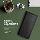 LG G5 Case | Signature - Black - Black leather wallet case for LG G5 on a green desk with office supplies.