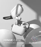 AirPods Pro 2 Case | Hinge Clear - Clear protective case for AirPods Pro 2 with a hinge design, shown open with earbuds.