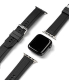 Apple Watch 42·41·40·38 mm | Rubber One Band - Black Apple Watch face with detached ribbed black rubber watch straps.