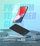 Galaxy A13 4G(LTE) / A13 5G Screen Protector [2P] | Invisible Defender - Galaxy A13 4G/5G Screen Protector - Tempered glass film hovering above a Galaxy A13 smartphone on a blue background.