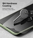 Galaxy A14 Screen Protector | Full Cover Glass - Galaxy A14 Screen Protector - A metal key resting on a phone screen protector, demonstrating 9H hardness scratch resistance.