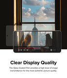 Galaxy A53 5G Screen Protector | Invisible Defender - Galaxy A53 5G Screen Protector - Transparent glass film hovering over a smartphone displaying a clear city skyline video.