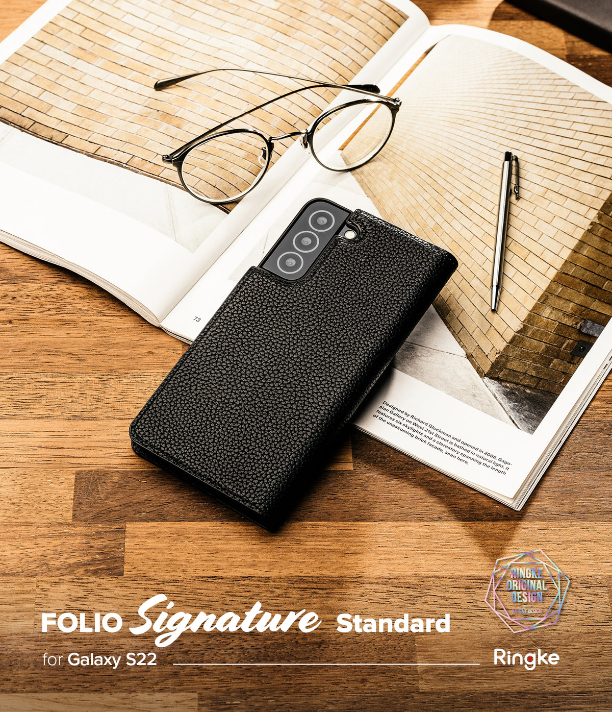 Galaxy S22 Case | Folio Signature Standard - Black textured leather folio case on an open book with glasses and a pen.