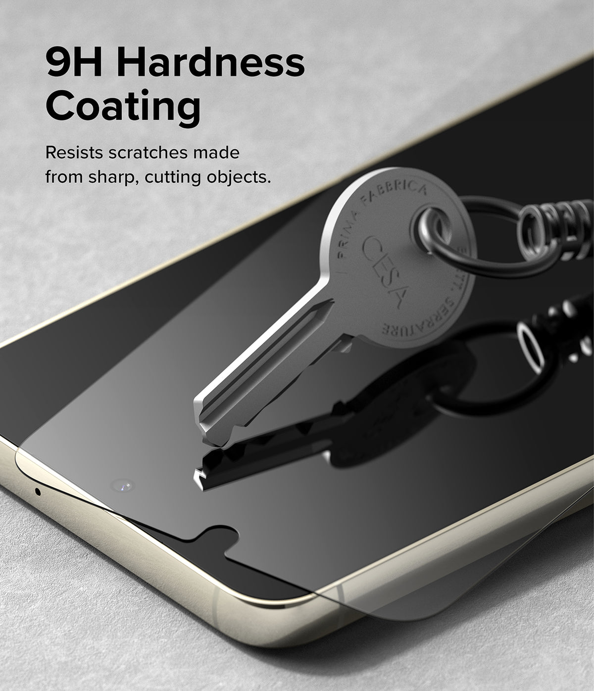Galaxy S23 Plus Screen Protector | Full Cover Glass - Galaxy S23 Plus Screen Protector - A metal key scratching a smartphone screen protected by a 9H hardness glass film.