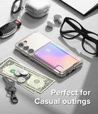 Galaxy S23 Case | Fusion Card - Clear phone case with a card holder, surrounded by keys, cash, and glasses on a desk.