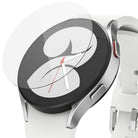 Galaxy Watch 5 / 4 40mm Screen Protector | Glass - R4 - Clear circular glass screen protector hovering above a silver smartwatch with a white band.
