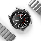 Watch Lug 22mm | Metal One Band α - Silver - Smartwatch with a black digital face and detached silver metal link band.