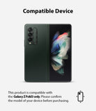 Galaxy Z Fold 3 | Camera Styling - A dark green Galaxy Z Fold 3 with a black camera lens protector being applied to the rear.