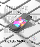 iPhone 14 Pro Max Screen Protector | Full Cover Glass - iPhone 14 Pro Max Screen Protector - Tempered glass film hovering over an iPhone 14 Pro Max surrounded by white phones.