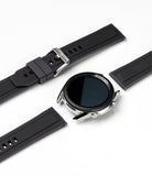 Watch Lug 22mm | Rubber One Band - A silver smartwatch case centered between two detached black ribbed rubber watch straps.