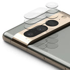 Google Pixel 7 Pro | Camera Protector Glass [3 Pack] - Three transparent lens protectors hovering above a smartphone.