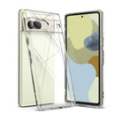 GIFT SET | Google Pixel 7 - A clear protective phone case shown next to a Google Pixel 7 smartphone with a light yellow back.