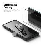 Redmi Note 10 / 10s Screen Protector | Invisible Defender - Redmi Note 10 / 10s Screen Protector - Smartphone with screen protector, a key, and a coin, demonstrating scratch resistance.