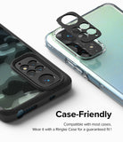 Redmi Note 11 | Camera Styling - Black adhesive camera lens cover being applied to a smartphone with a clear glitter case.