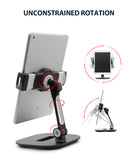 Iron Tablet Stand - Adjustable stand holding a tablet with red arrows indicating 360-degree rotation and tilt capabilities.