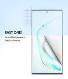 Galaxy Note 10 Screen Protector | Dual Easy Film - A screen protector being applied to a phone, lifting dust off the screen.