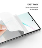 Galaxy Note 10 Screen Protector | Dual Easy Film - Galaxy Note 10 Screen Protector - A hand applying a clear film protector to a smartphone screen with text overlay.