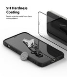 iPhone 12 / 12 Pro Screen Protector | Invisible Defender Glass - A key and coin resting on a phone with a screen protector.