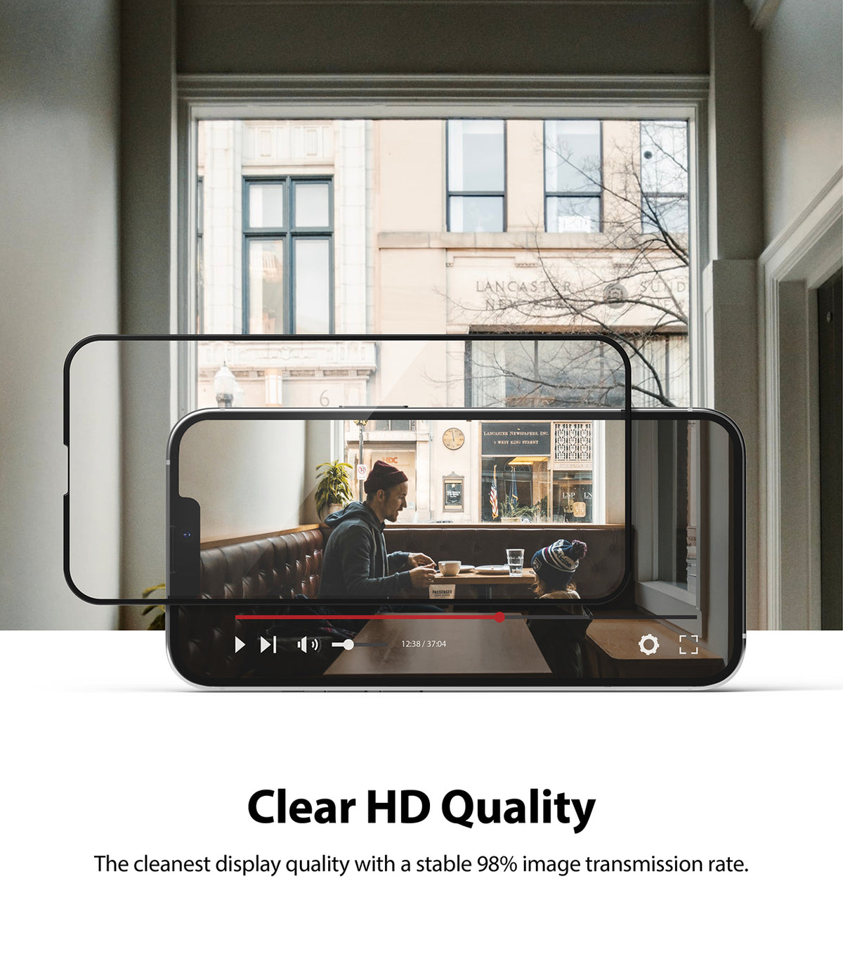 iPhone 13 Pro Max Screen Protector | Invisible Defender Glass - iPhone 13 Pro Max Screen Protector - A clear glass screen protector hovering over an iPhone displaying a video.