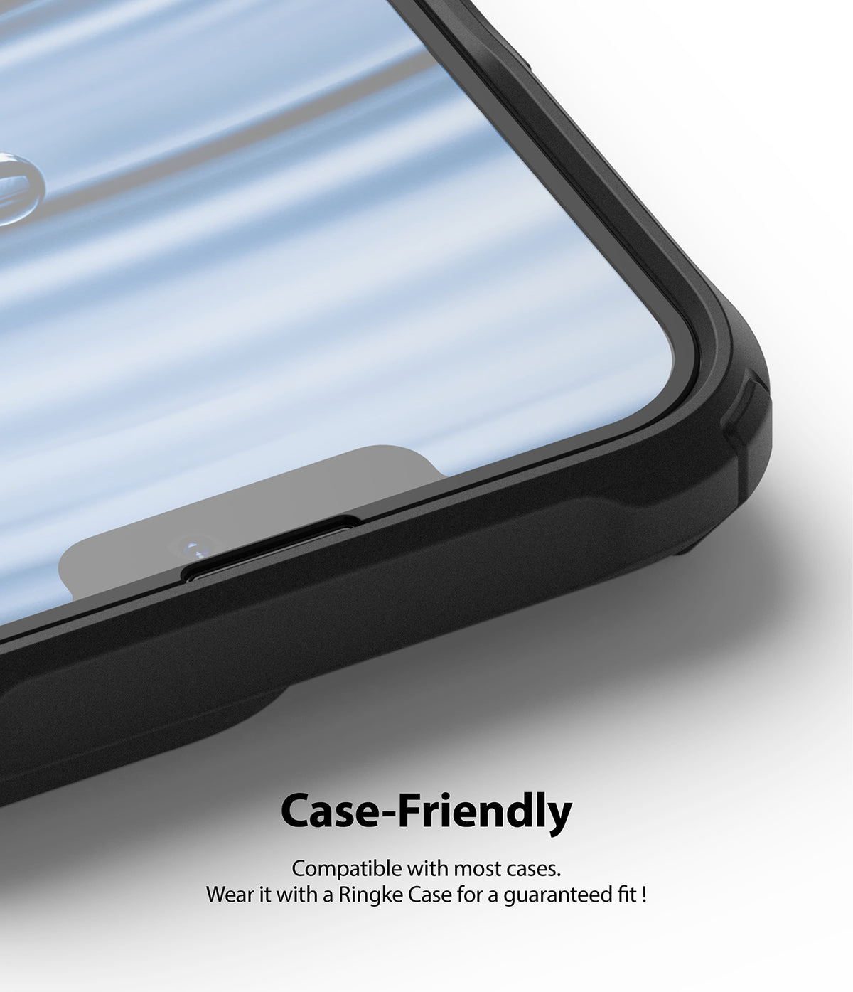 iPhone 13 Pro Max Screen Protector | Invisible Defender Glass - iPhone 13 Pro Max Screen Protector - Close-up of a phone screen with a glass protector inside a black protective case.