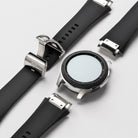Galaxy Watch (46mm) | Rubber One Prime Band - Silver Galaxy Watch face with detached black ribbed rubber watch straps.
