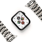 Apple Watch 49·46·45·44·42 mm | Metal One Band - Black Apple Watch with a white face and silver metal link band.
