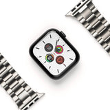 Apple Watch 49·46·45·44·42 mm | Metal One Band - Black Apple Watch with a white face and silver metal link band.